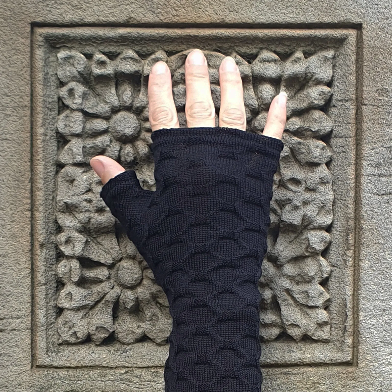 Black textured knit merino fingerless gloves